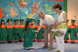 Children Receiving their Certificates